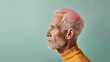 Profile of senior men with pink hair on pastel background.