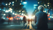 © Rezhwan - An elderly person sits in contemplation on a city bench at dusk, the hustle of city life blurred in the background