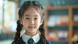 © Julia Zarubina - little korean schoolgirl in school class, cute asian girl, japanese, chinese, study, education, smart child, clever kid, children, knowledge, chalk board, portrait, people, person, black hair