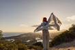 Woman waving handkerchief in wind, in nature at sunset!!!