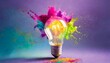Creative concept light bulb explodes with colorful water colors on a light purple background. Think different, creative idea. Productivity and creativity 