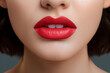 A captivating close-up of a girl with striking red lips, accentuated by bold lipstick, embodying the allure of beauty and the realm of lip cosmetics in a mesmerizing image. Close up