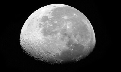 Wall Mural - the waning gibbous phase is when the lit-up part of the moon shrinks from 99.9% to 50.1%