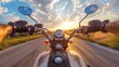 Motorcyclist s point of view  riding a motorcycle at high speed on a highway during sunset