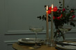 © New Africa - Romantic table setting with candles and flowers, space for text