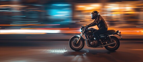 man night ride motorcycle with blurred light effect on the background