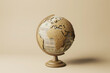 © hasara - Cork globe with pushpins on a beige background. Travel planning and adventure concept for design and print, suitable for travel agency advertising or educational geography material.
