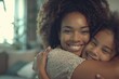 © Deivison - Mother hugging her smiling daughter, Mother's Day concept.