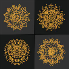 Set of vector mandala patterns in gold colours on a black background