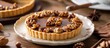 Decadent Chocolate Tart with Nut Toppings on a Plate for Gourmet Dessert Lovers