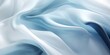 Abstract white and Blue  silk fabric weave of cotton or linen satin fabric lies texture background.