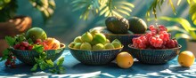 Fresh Fruits In Bowl On Blue Surface