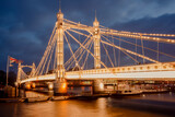 Fototapeta Miasto - Albert Bridge is a road bridge over the River Thames connecting Chelsea in Central London