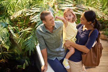 happy family, child and pointing at zoo with tourist for sightseeing, travel or tour on trip. father
