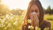 a woman sneezing into a paper tissue. allergies, hay fever, colds, Spring allergies, and getting sick concept. on meadow background with copy space.