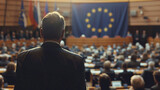 Fototapeta  - European Union politics concept image with back view of formal unrecognizable politicians at EU parliament in front of the European Union flag