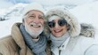 © Ilja - Joyful senior man and woman with big smiles, enjoying a scenic mountain hike in the great outdoors