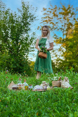 Wall Mural - A woman collects medicinal herbs