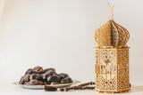 Fototapeta  - Arabian lantern, dates and rosary. Islamic holidays concept. Ramadan decoration. Ramadan kareem.