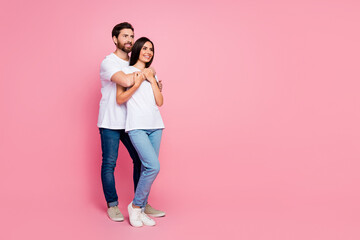 Sticker - Full length photo of lovely young couple hug look empty space promotion wear trendy white outfit isolated on pink color background