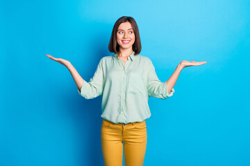 Wall Mural - photo of adorable cute woman with bob hairstyle dressed turquoise shirt palms hold objects empty spa