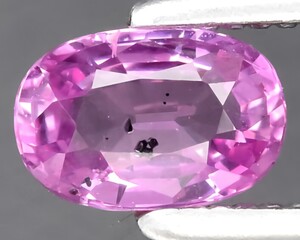 Wall Mural - natural pink sapphire gem on the background