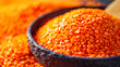 Red lentils (masoor dal) background, close up view