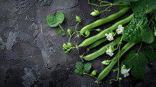 Fresh Green Beans Of Peas With Flower On Stone 