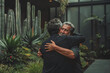 © ADDICTIVE STOCK - Father and son embracing on fathers day. Generative AI