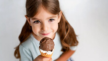 Portrait A Smiling Little Girl, Holding A Chocolate Ice Cream On A White Background With Copy Space. Generative Ai.