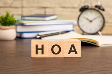 Poster - the wooden blocks forming the word HOA - Homeowner Association concept