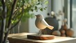 Wooden bird figurine on table in living room, closeup