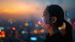 A young woman wearing a protective face mask overlooking a cityscape engulfed in air pollution at dusk.