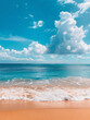 A vertical picture of a seaside beach with waves lapping up on the sand against a beautiful summer sky.
