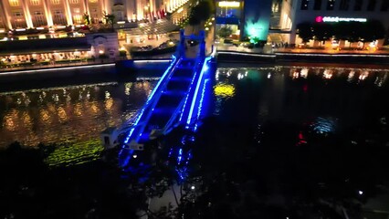 Wall Mural - Singapore - August 19, 2023: Aerial view of Boat Quay and city skyline from Cavenagh Bridge