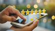 close up on customer man hand pressing on smartphone screen with gold five star rating feedback icon and press level three rank (good) for give score point to review the service business concept