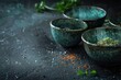 herbs and spices are shown in bowls on the dark background background, in the style of marble, mediterranean landscapes, orange and aquamarine