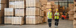 © chokniti - Man and woman workers with clipboard discussing working and checking stock inventory wood plank material for making wooden pallet products at warehouse industrial factory, woodwork production