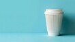 a white Plastic Disposable Cup or Coffee Paper Cup with white cap isolated on soft blue background. take away. mockup. copy space. 