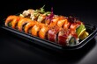 Hearty sushi on a metal tray against a white ceramic background