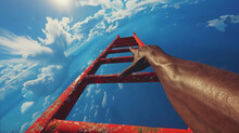 Person's Hand Gripping A Rung Of A Red Ladder That Extends Upwards Towards A Clear Blue Sky Dotted With White Clouds.