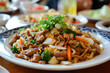 A plate of moo shu pork, a dish of northern Chinese origin, possibly originating from Shandong.