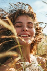 Canvas Print - A woman with her hair blowing in the wind. Suitable for various fashion or beauty concepts