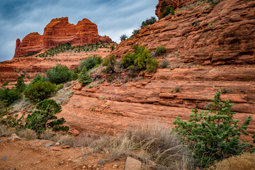 Wall Mural - Red rock formations of Damfino Canyon in Sedona Arizona on a cloudy day