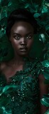 Fototapeta Konie - beautiful black woman model in emerald green dress 