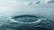 An isolated circle floating gracefully on the surface of the ocean, its smooth curvature contrasting with the rippling water below
