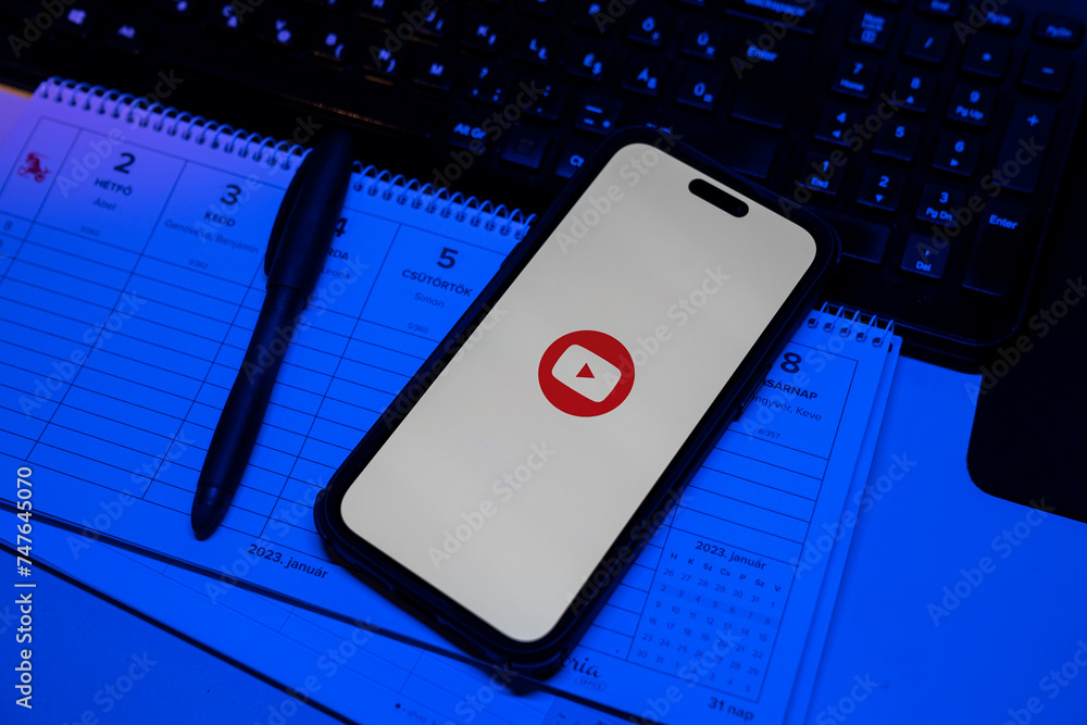 Apple iPhone 14 Pro Max smartphone with YOUTUBE logo. YouTube is a ...
