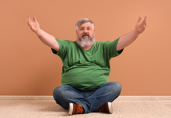 Sticker - Mature man opening arms for hug near color wall