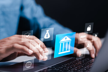 Online banking concept. online shopping, Finance and banking network. currency exchange. Person using laptop with banking icon on virtual screen.