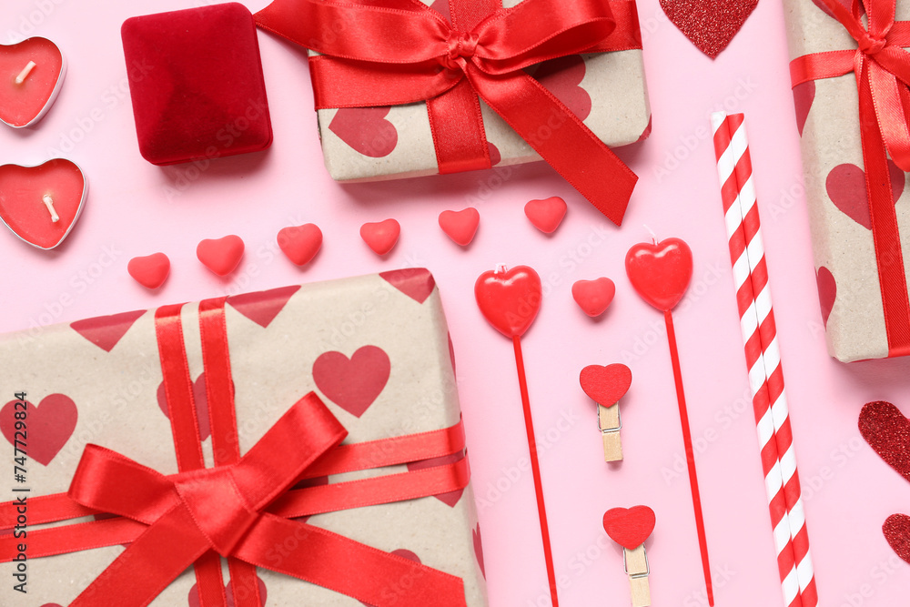 Composition with gifts, box for engagement ring and decor on color background. Valentine's Day celebration